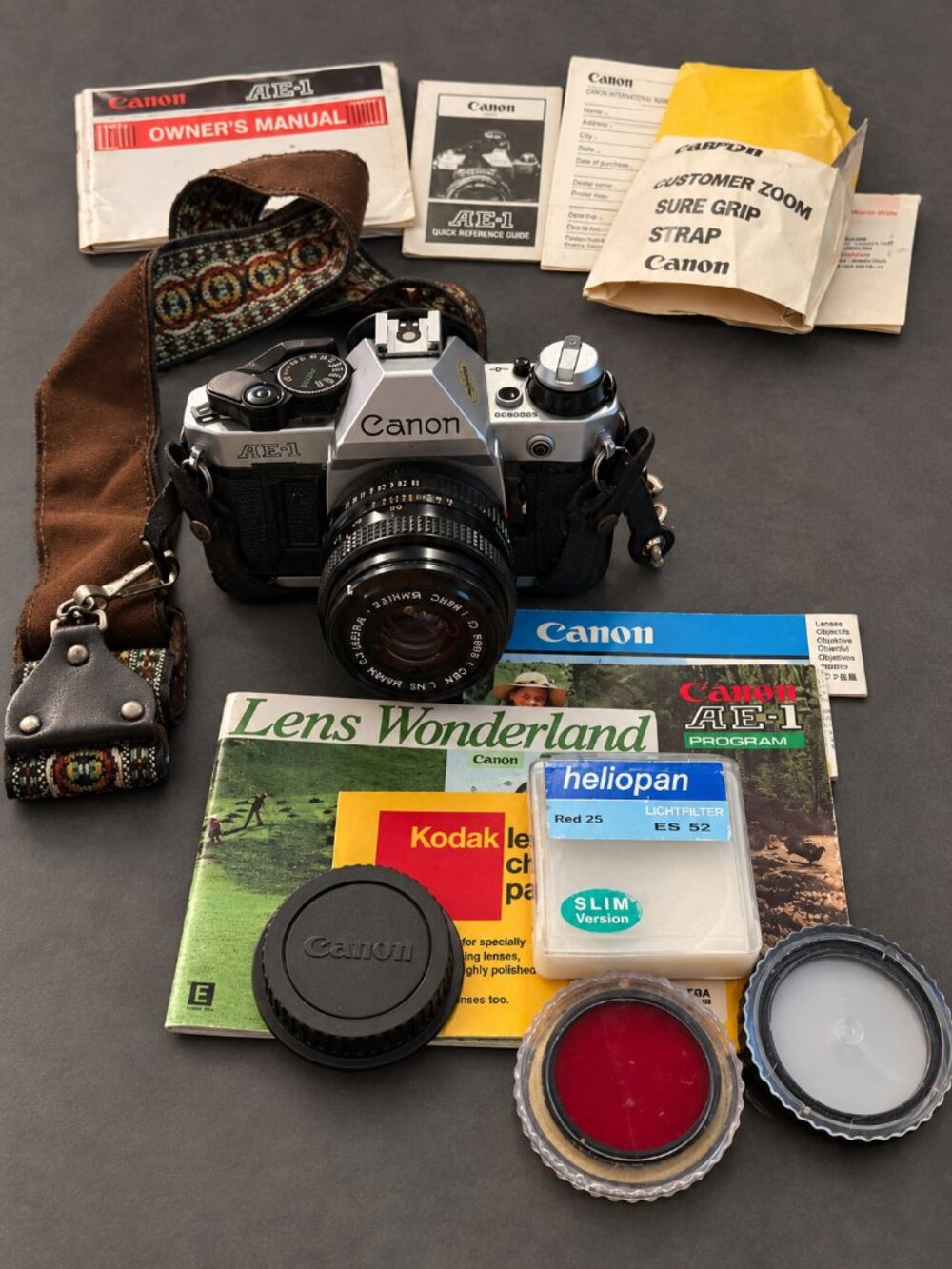 Vintage Canon AE-1 35mm Film SLR Camera With Lens, Case, Filters & Manuals